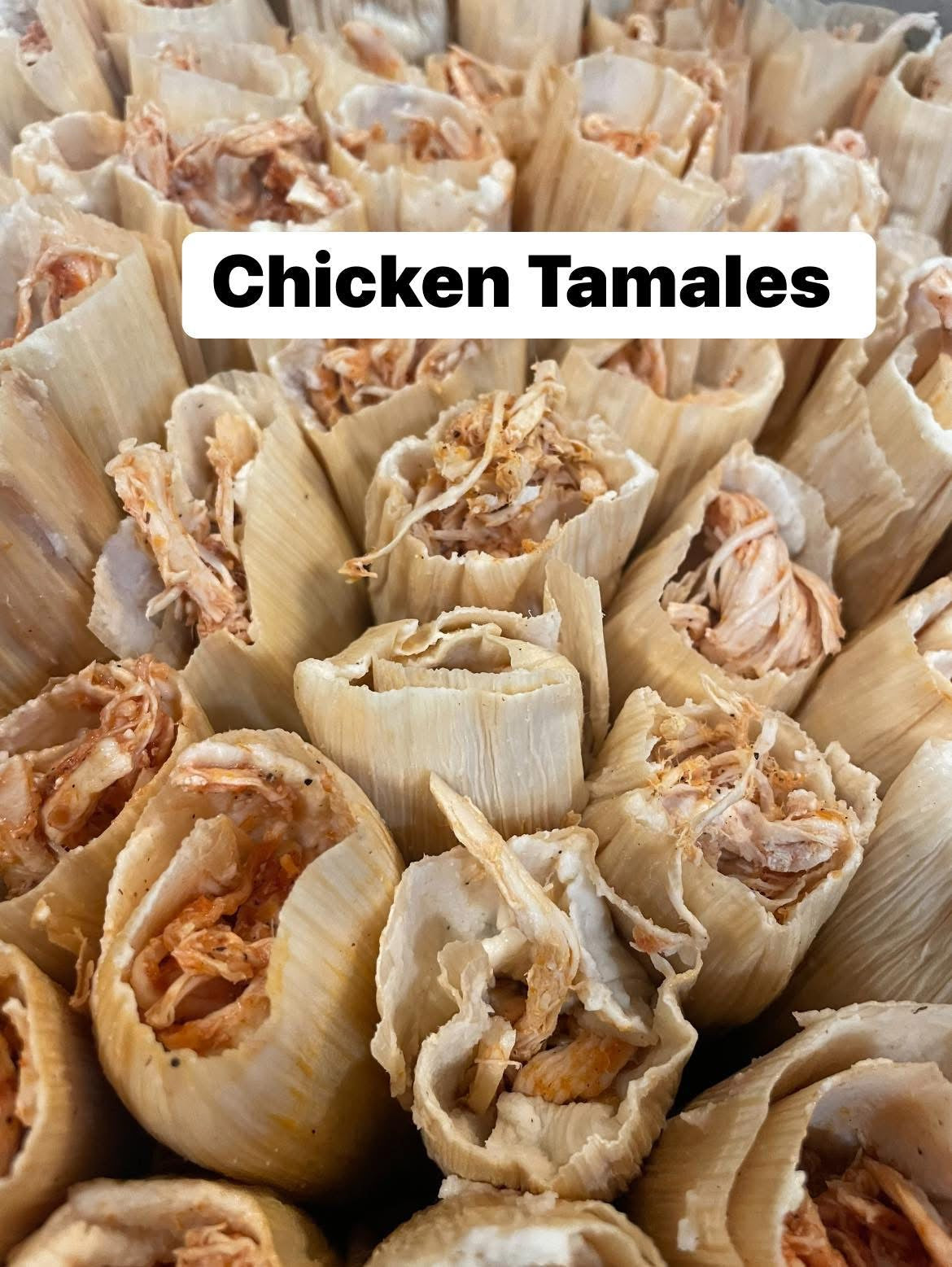 Close-up of Original chicken tamales with 'Chicken Tamales' text overlay.